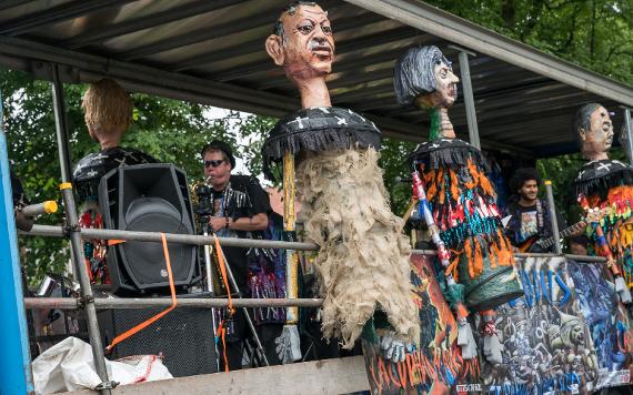 Band playing instruments on 2017 Caribbean Carnival parade float.