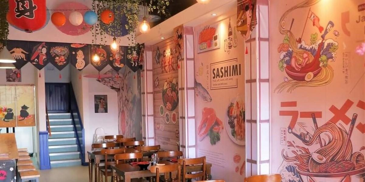 The main seating area for Meiz Japanese restaurant decorated with paper lanterns