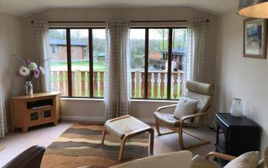 A view of a living room inside a lodge at Bowland Lakes Leisure Village