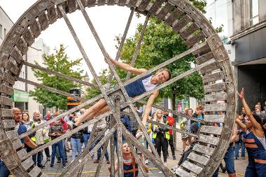 Woman inside giant wheel