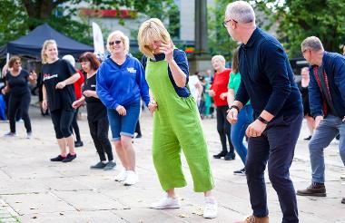 People dancing on the Flag Market