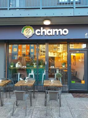 The outside seating and frontage of Chamo Street Food in Preston