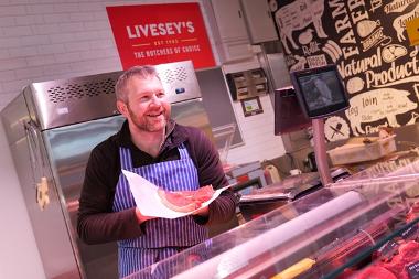 Trader serving meat