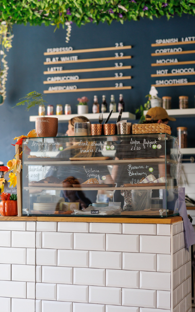 Cakes behind counter