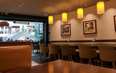 A view of the seating area inside Krispy Kreme in Saint George's Shopping Centre