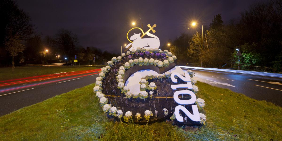 Preston Guild 2012 letter G floral sign at night