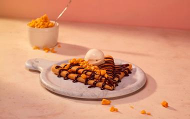 Dark chocolate, crunchy honeycomb and white chocolate gelato on top of a Heavenly Desserts crepe.