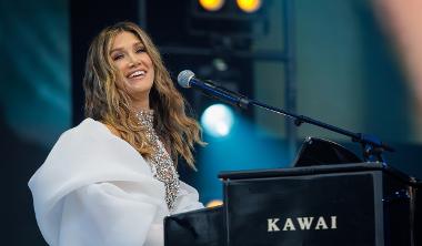 Delta Goodrem playing piano