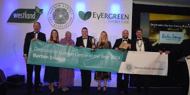  Members of the GCA awarding Guy Topping (left) and representatives from Barton Grange Garden Centre at the GCA Conference