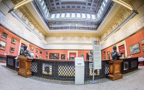 Sculptures and artwork on the second floor balcony of the Harris Museum and Art Gallery.