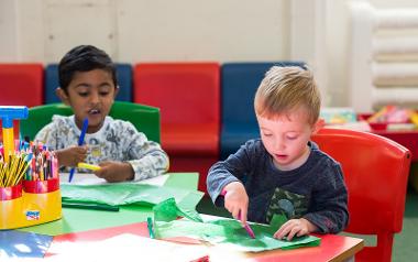 Children taking part in crafts in the Harris' library.