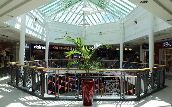 Shops and balcony inside St George's Shopping Centre.