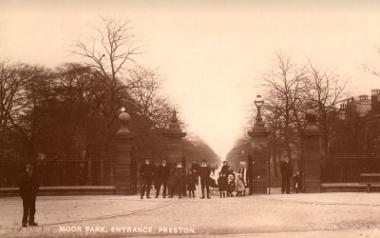 Sepia photograph of group stood around the entrance of Moor Park.