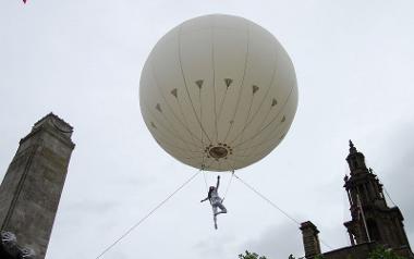 Performance taking place involving giant balloon for Preston Guild 2012.