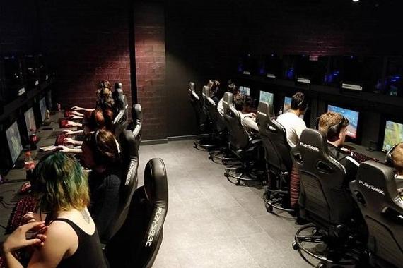 Gamers at gaming PCs in Belong Gaming Arena, Preston.