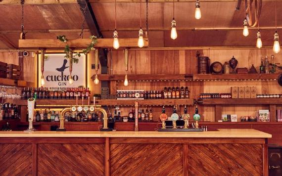 Wooden bar area inside Brindle Distillery.