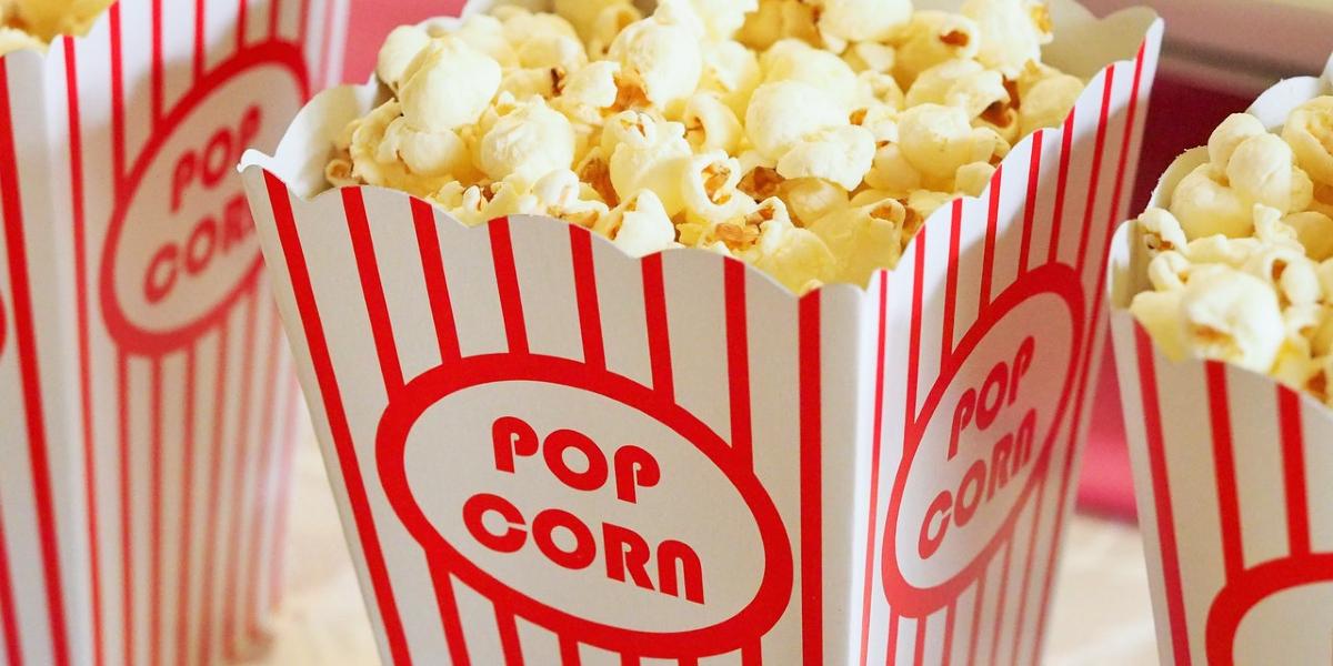 Close-up of cinema popcorn in tubs.