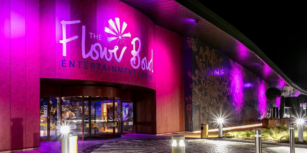 Flower Bowl Entertainment Centre entrance lit up in pink.