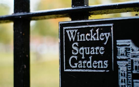 Close up of Winckley Square Gardens sign.