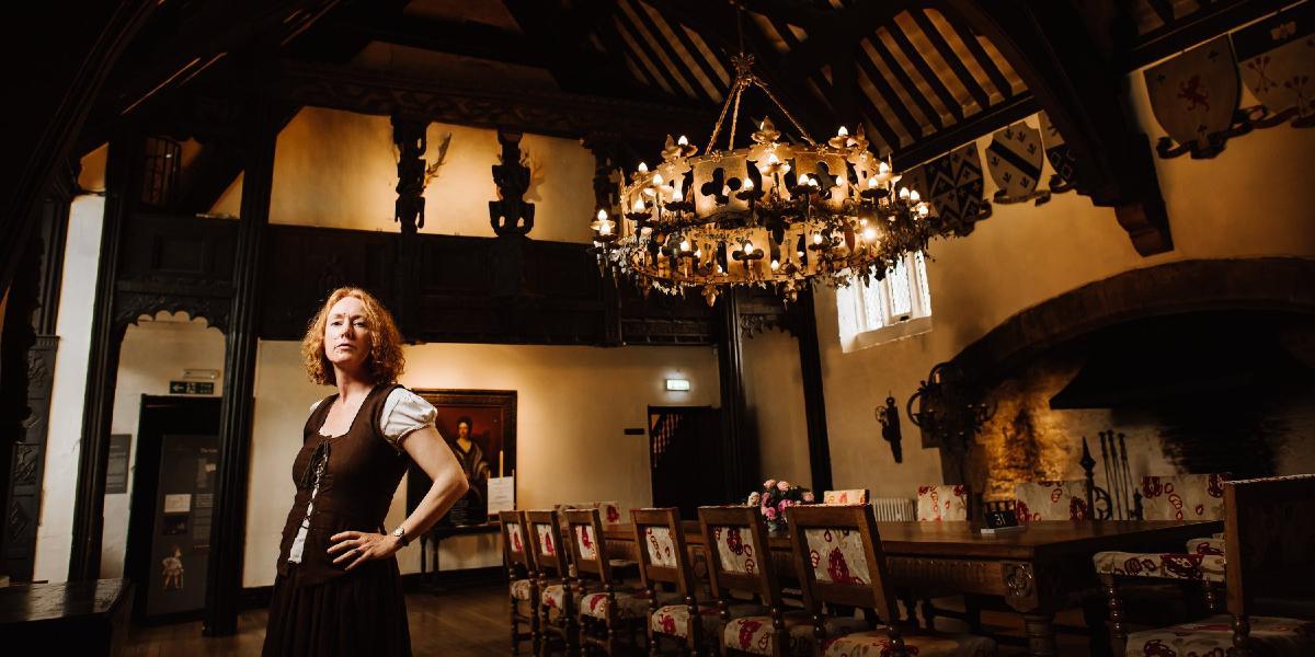 Janey the Witch tour guide stood inside Samlesbury Hall.