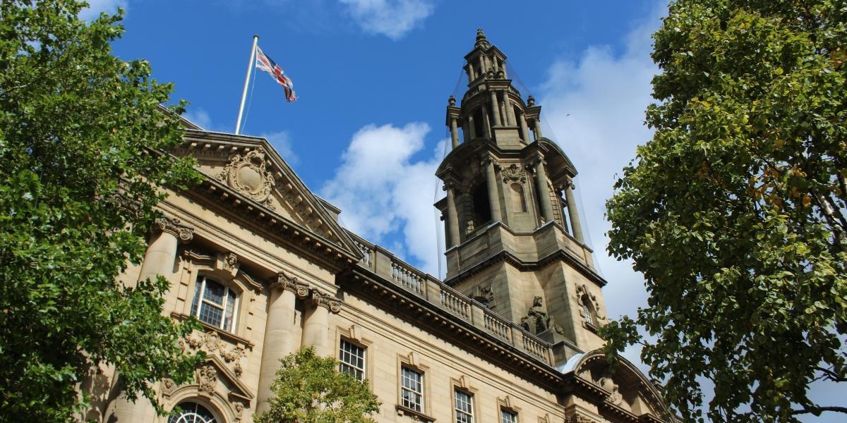 Looking up at Preston Sessions House and British flag flying.