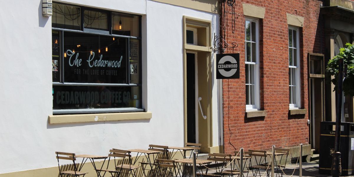 Main image: Cedarwood Coffee Co. outdoor seating on Winckley Street, Preston.