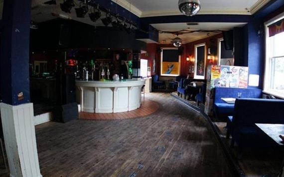 Bar area and booths inside The Ferret.