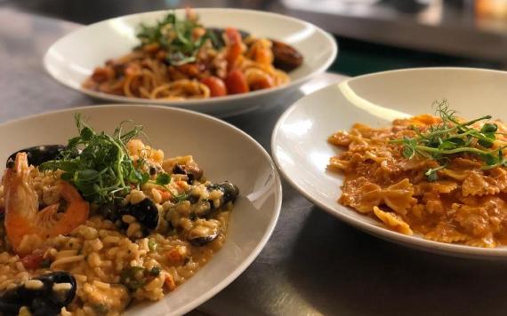 Risotto, ravioli and spaghetti dishes ready to be served at Pinocchio's restaurant.