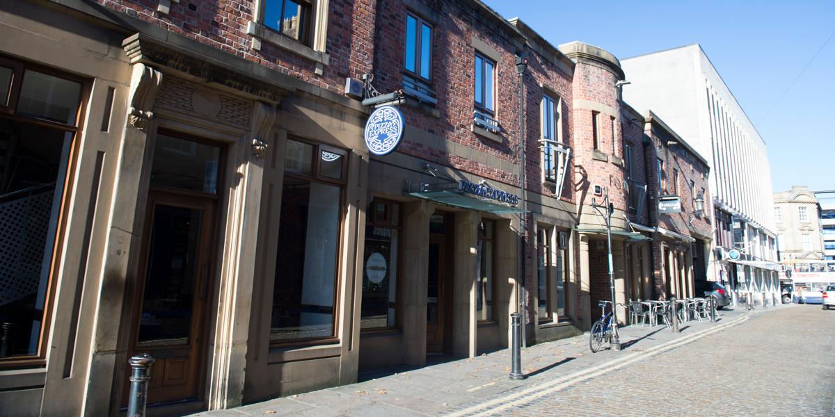 Entrance and front of Pizza Express restaurant on Winckley Street, Preston.