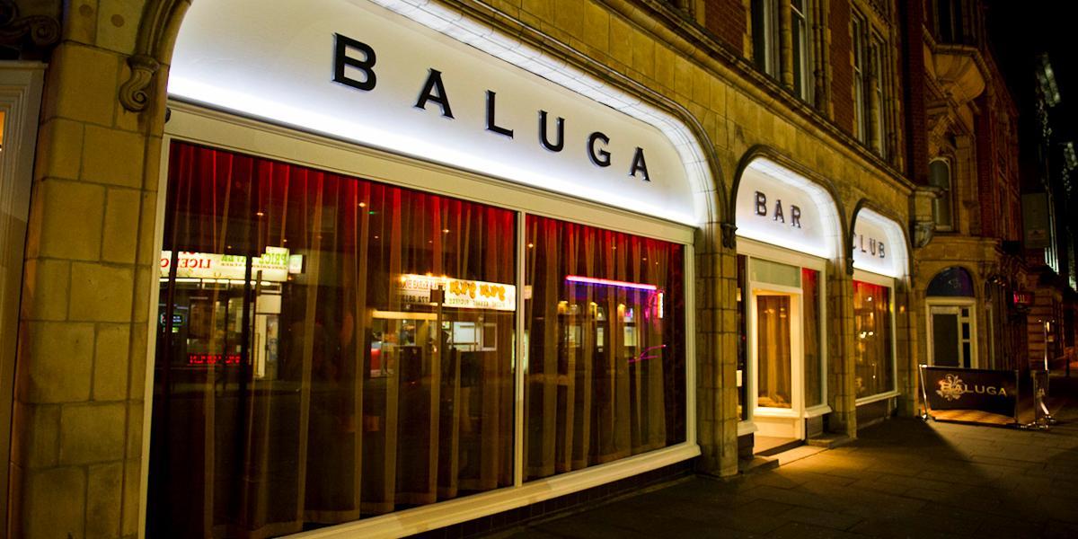 Baluga Bar and Club exterior at night.