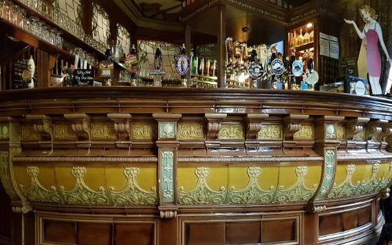 Ornate Victorian bar area inside The Black Horse.