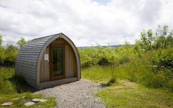 Bowland Wild Boar Park camping pod with countryside views around it.