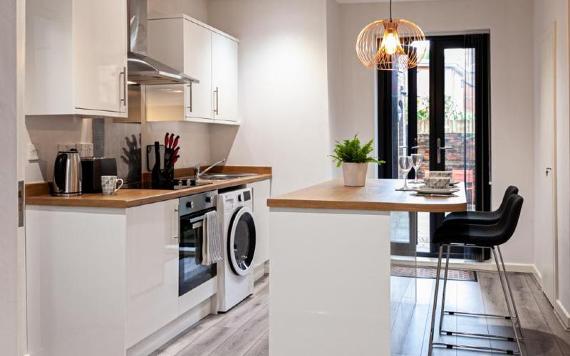 Modern kitchen and dining area in City Haven Apartments.