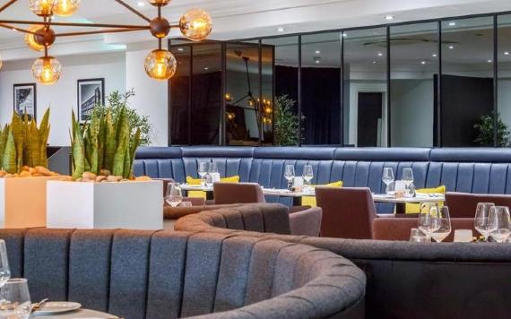 Round booths inside Samlesbury Hotel's restaurant.