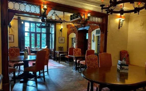 Traditional dining area inside Villa Wrea Green.