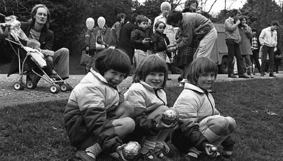 Children at 80s Egg Rolling event in Avenham Park, Preston.