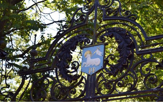 Preston Lamb coat of arms on iron gates to Haslam Park.