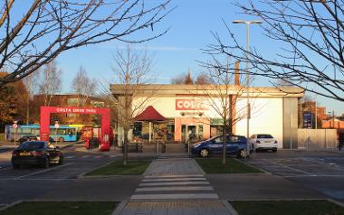 Crossing at Queens Shopping Park to Costa entrance and drive through.