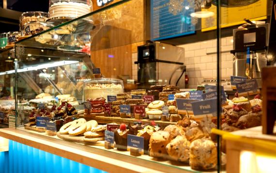 Array of cakes in display case at Bob and Berts Preston.