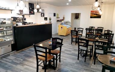 Seating and café counter inside Tuscany Café.